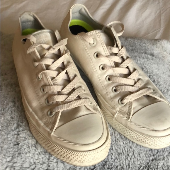 cream colored chucks